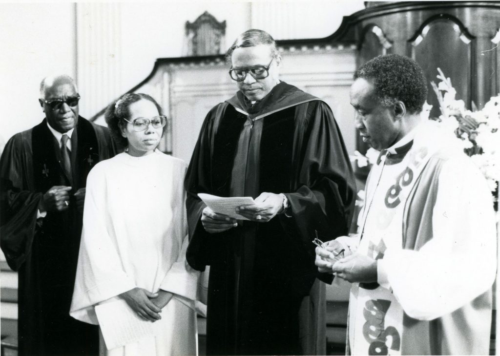Rev. Eaton participates in the ordination of Rev. Yvonne K. Chappelle, the first female African American Unitarian Universalist minister, November 21, 1981. Rev. Leon E. Wright (left) and Bishop John T. Walker (right) participate in the service.