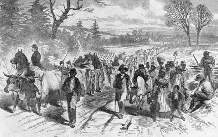 Freed slaves marching down a road in a rural setting