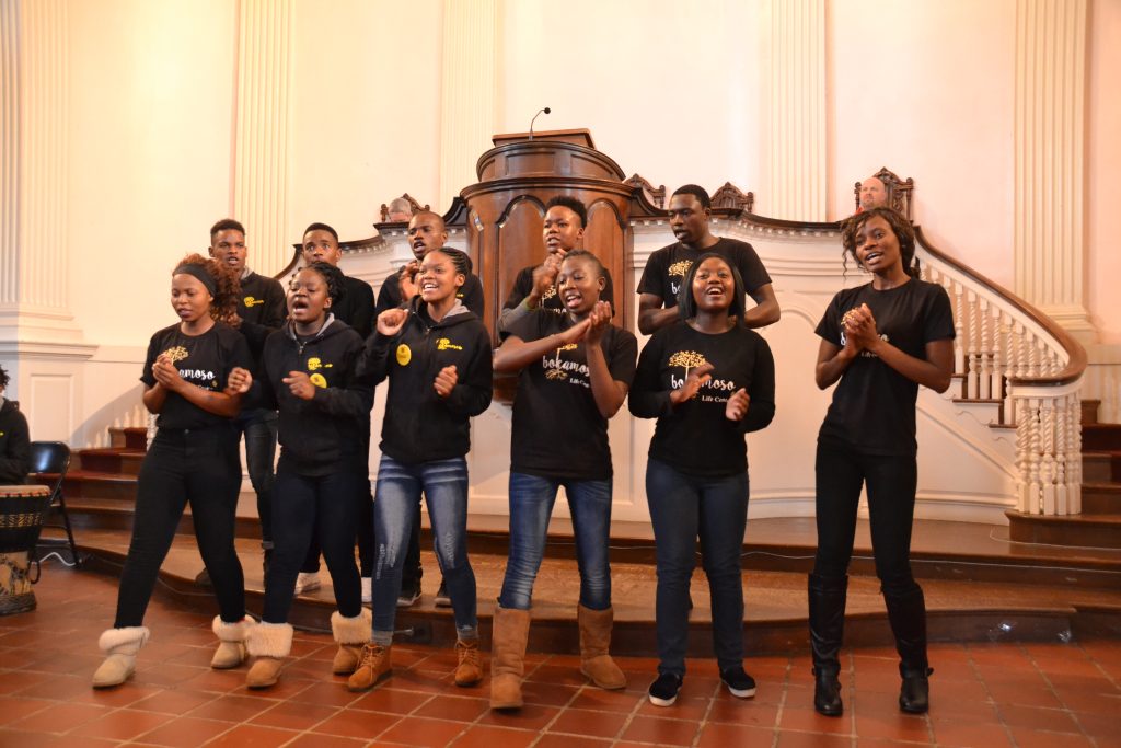 The Bokomoso Youth Choir performing in the All Souls Sanctuary in 2019