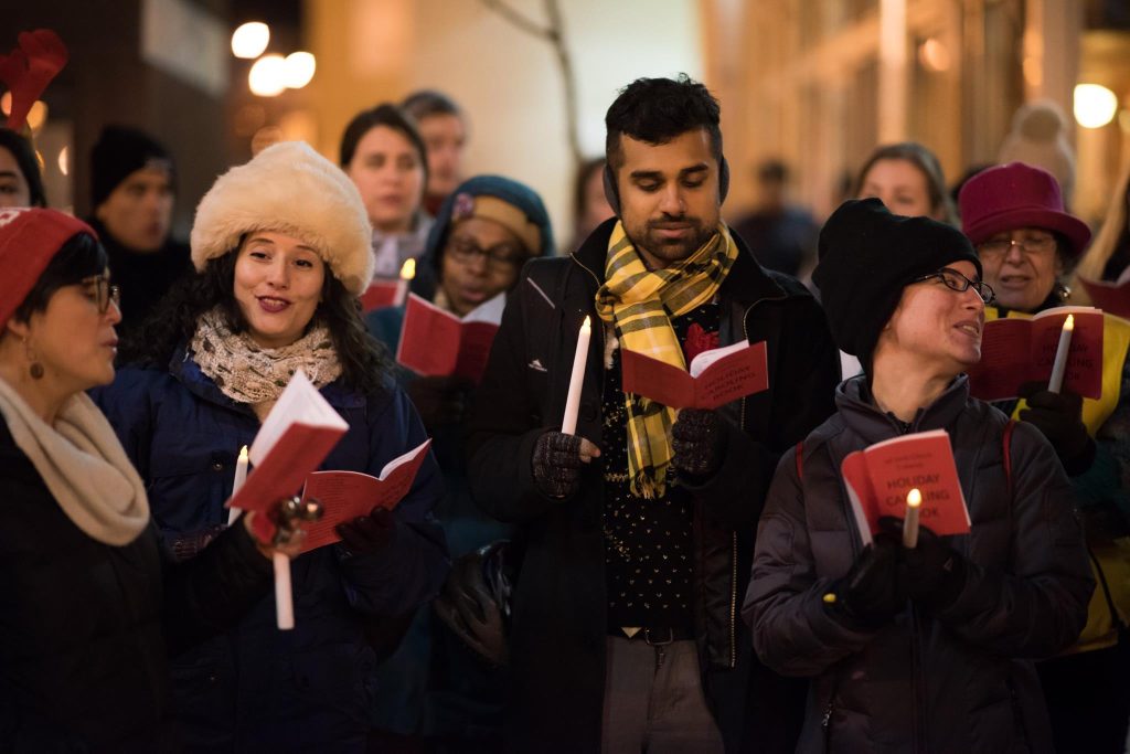picture of congregants caroling in Columbia Heights
